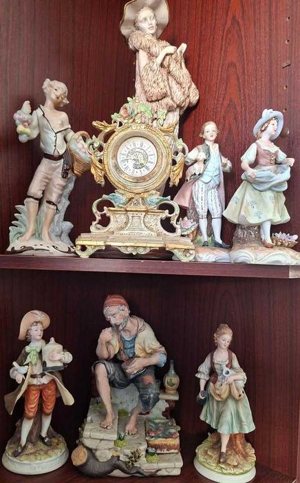 Estatuetas loiças decorativas