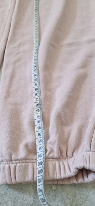 Nike Luźne spodnie dresowe pudrowy róż 38 40 M L