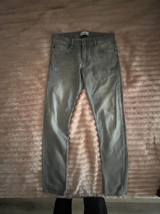 Джинсы stone island