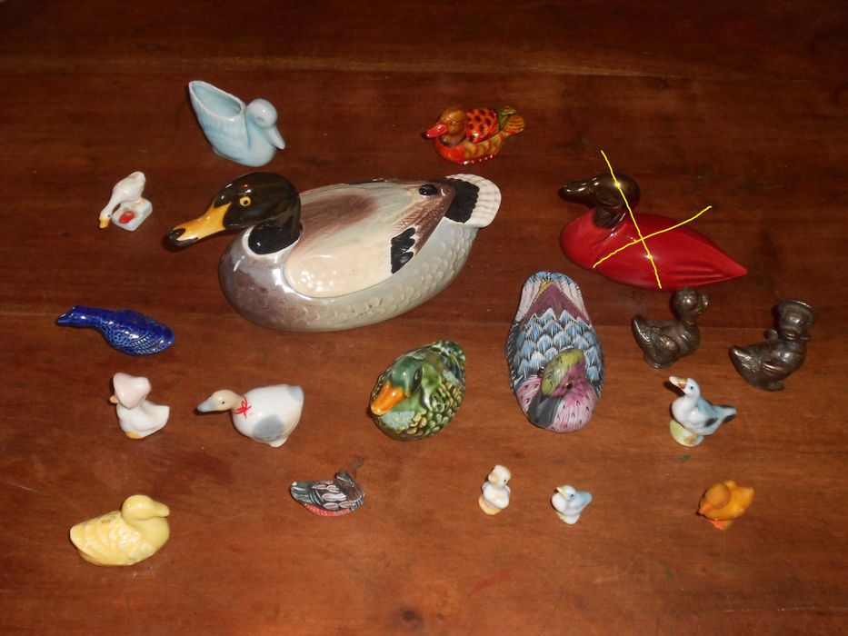 Diversos patos e gansos em loiça e latão colecçao