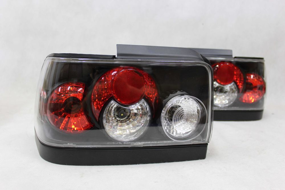 Lampy światła tył tylne Toyota Corolla Typ E10 93-97 Black Tuning NOWE