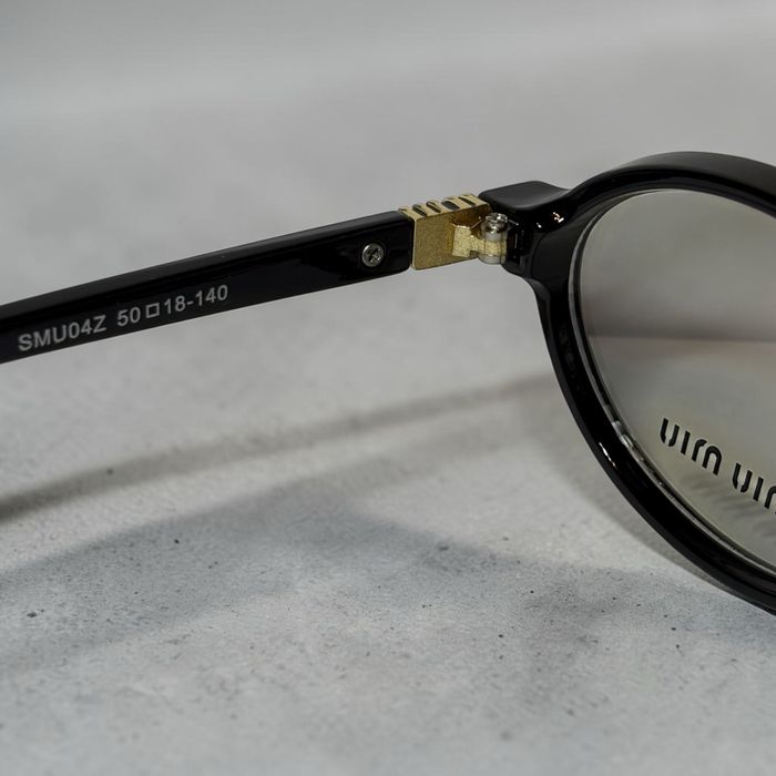 Жіночі окуляри Miu Miu