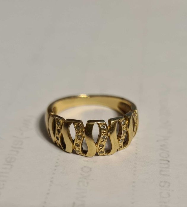 Złoty pierścionek z cyrkoniami, pr 585, roz 14 nieskończoność