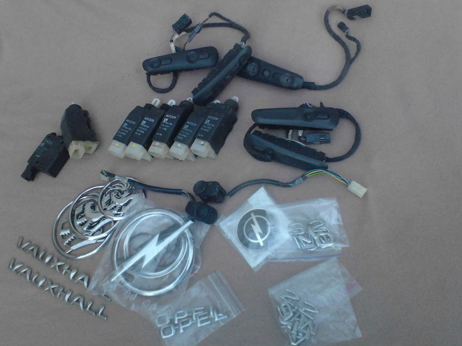 Актуаторы кнопки значки центральный замок Opel Omega B.