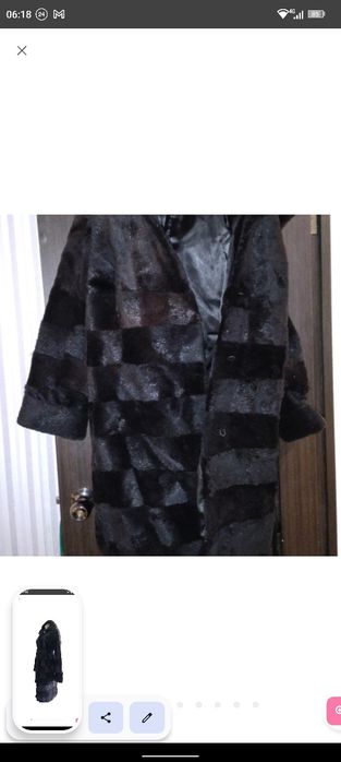 Шуба норкова чорного кольору з капюшоном