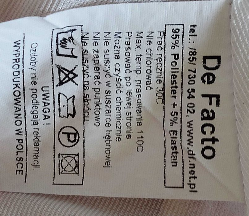 Sukienka  z wytłaczanym wzorem rozmiar 38