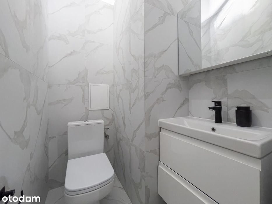 Przestronny Apartament z 2 Sypialniami i Balkonem
