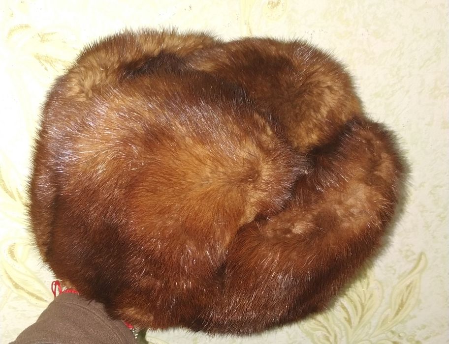 Норкові шапки нові