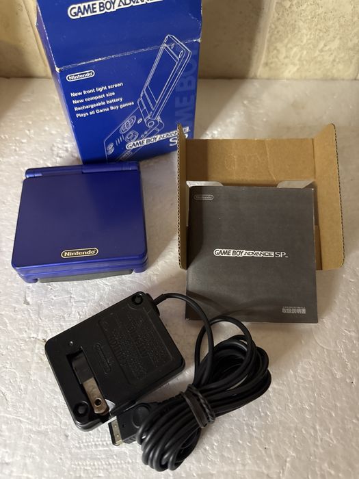 Konsola Nintendo Game Boy Advance SP - niebieska, w pudełku z ładowarką, grą i instrukcją