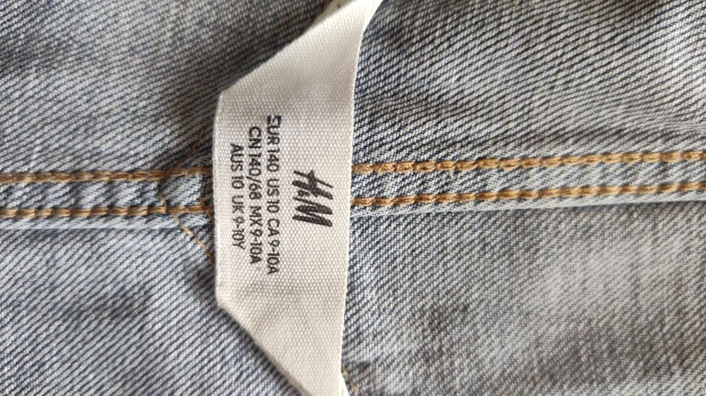 Spodnie dziecięce jeansowe ogrodniczki H&M  140