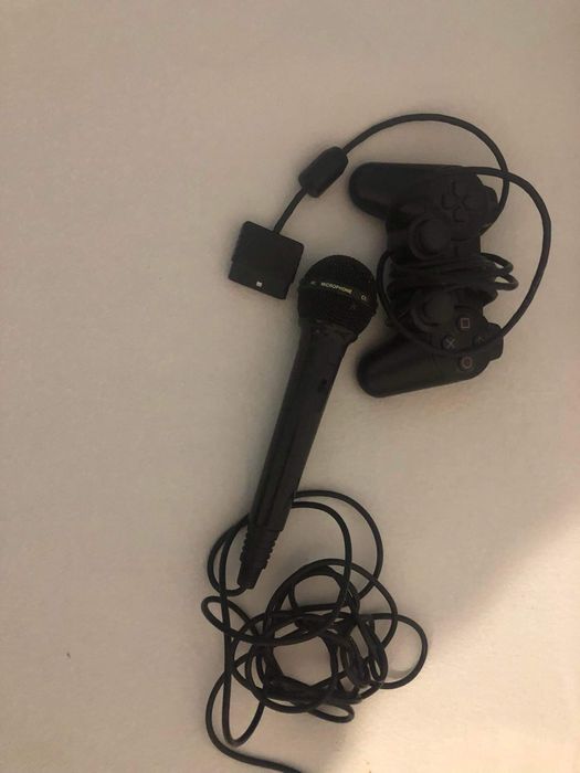 PLAYSTATION 2 sprawne w stanie jak na zdjęciu pad plus mikrofon i gra