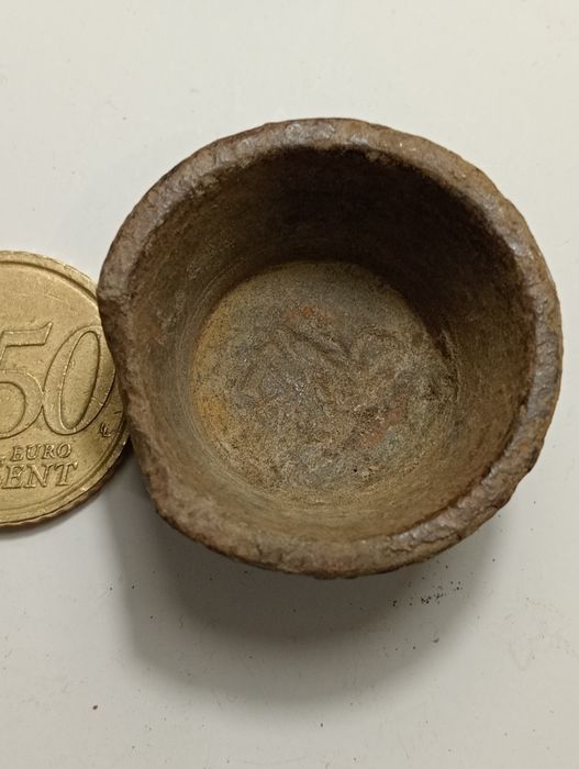 Peça antiga em metal