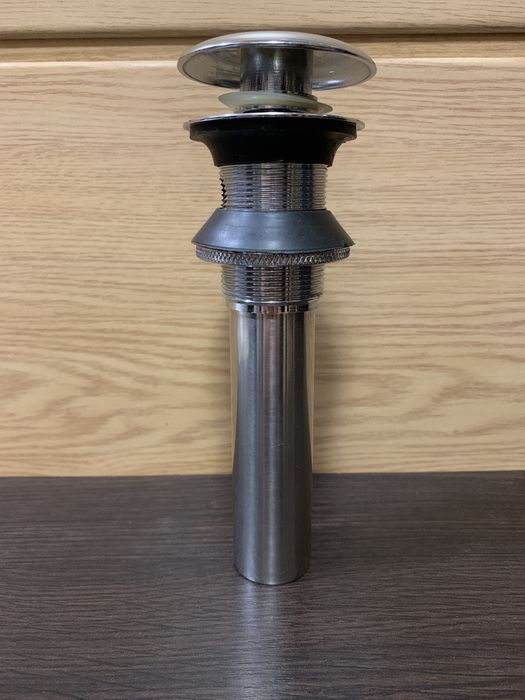 Аксессуары для ванной комнаты: донный клапан и смеситель TUNY