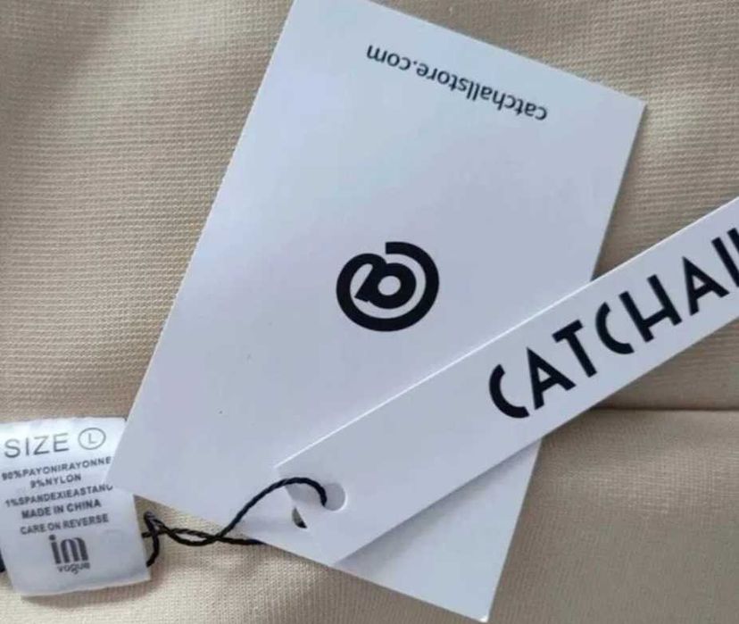 Dopasowana sukienka Catchall