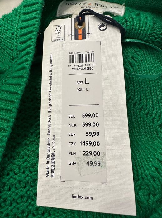 Sweter z długim rękawem i falbankami na ramionach