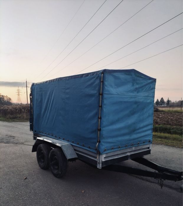 До вашої уваги бортовий 2-х осний причеп