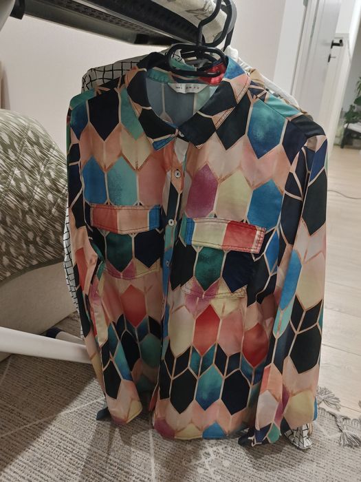 14 koszul w rozmiarze S/M lub oversize. Bez zniszczeń