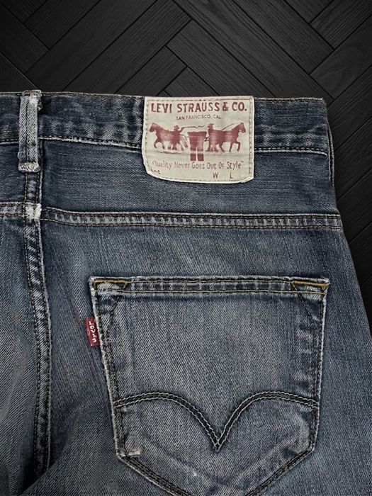 Джинсы Levis bootcut 512 527 faded distressed washed jeans