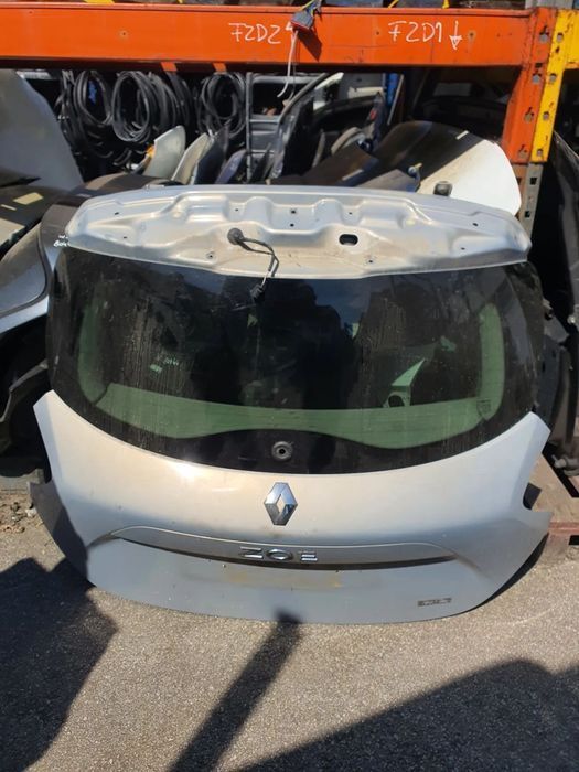 TAMPA MALA RENAULT ZOE