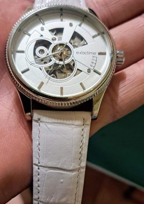 Relógio automático exactime.