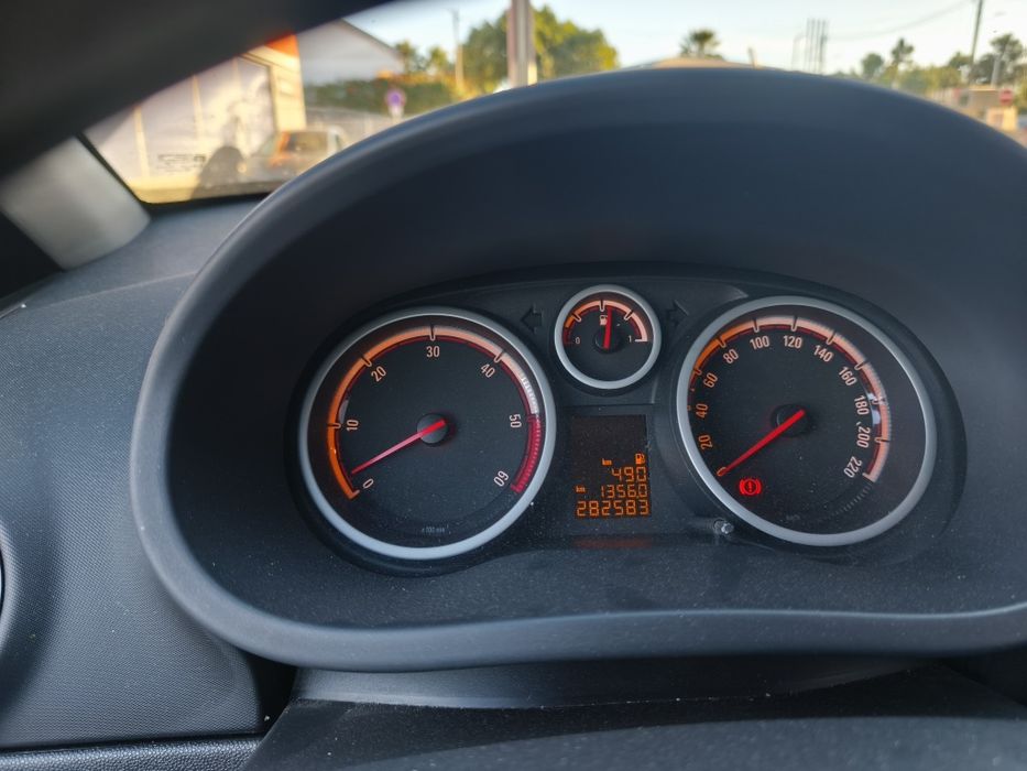 Opel corsa D CDTI 1.3 — photo 4