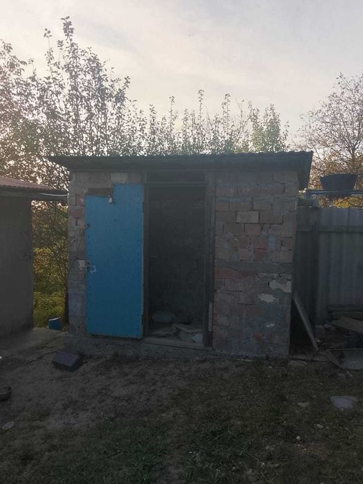 Земельна ділянка з будинком