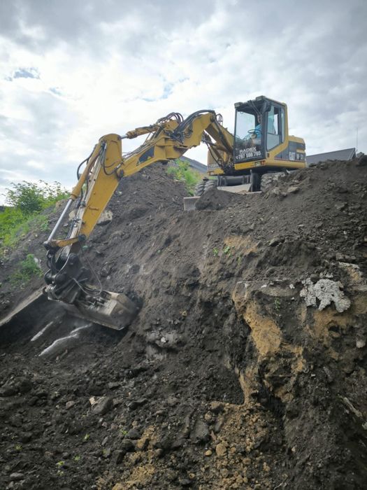 Cat M312 koparka kołowa