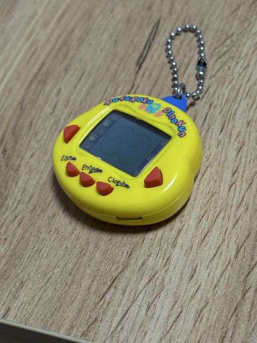 Тамагочи динозавр серии динки Dinkie Dino rakuraku dinokun tamagotchi