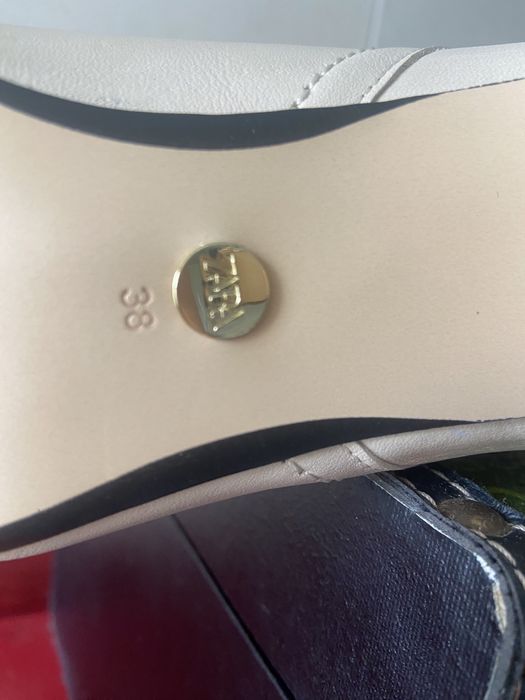 Botas em pele de cano alto