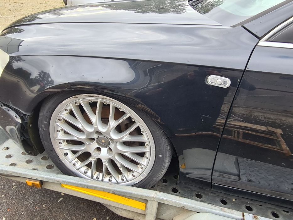 Błotnik lewy przód prawy czarny AUDI A6 C6 2008r LZ9Y