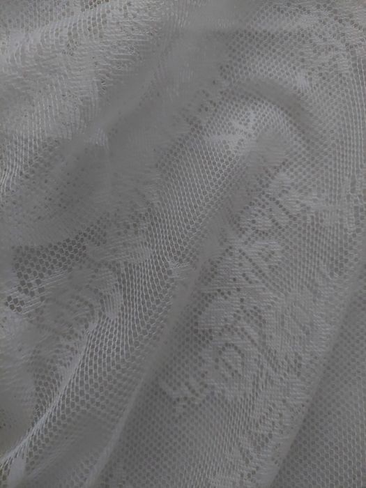 Dwie nowe firany żakardowe że spinkami