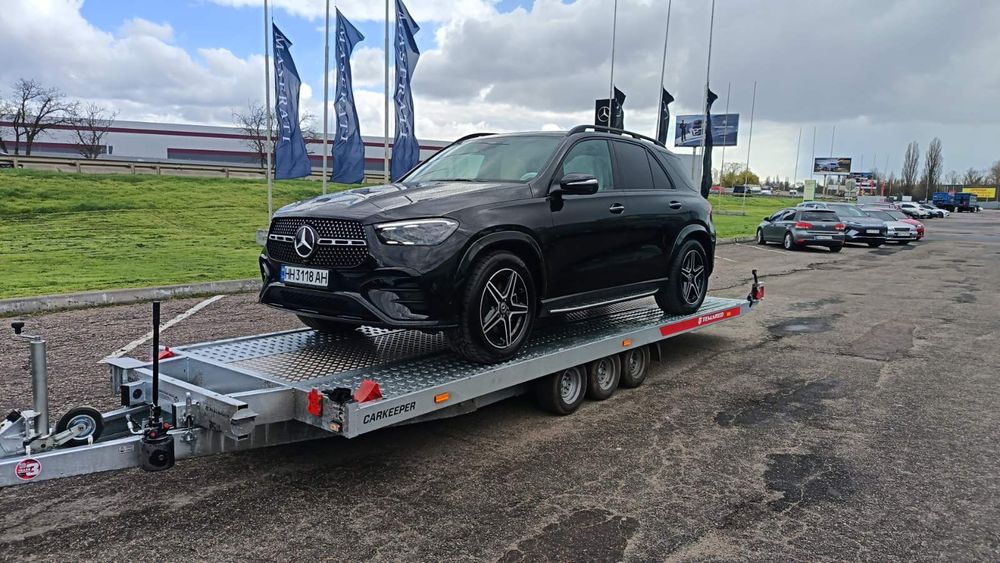 Доставка авто перевозка авто в Україну Автовоз евакуатор лафет