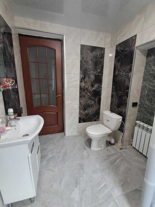 Продам дом с участком 8 сот. Новый евроремонт. Проспект Металлургов. Гараж.