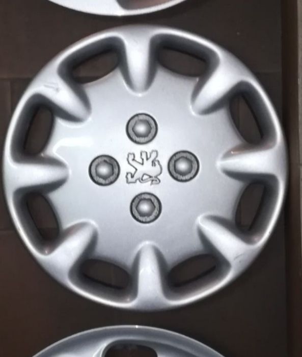 Tampão Peugeot jante 13