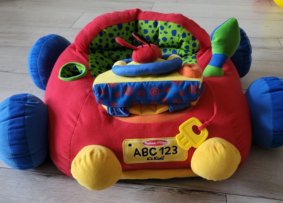 Pluszowy samochodzik siedzisko z interaktywną kierownicą