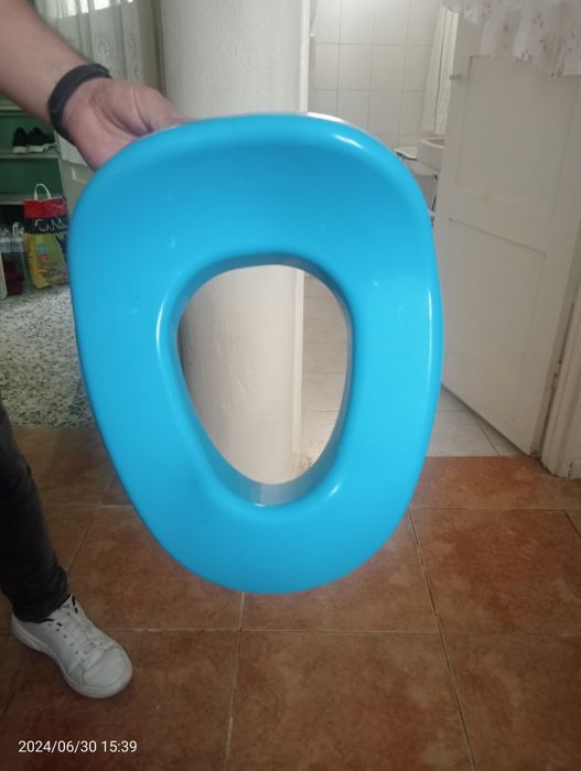 Redutor de sanita criança