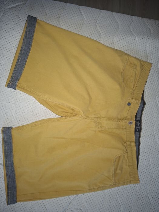 Męskie, żółte krótkie spodenki r. 38 Carry