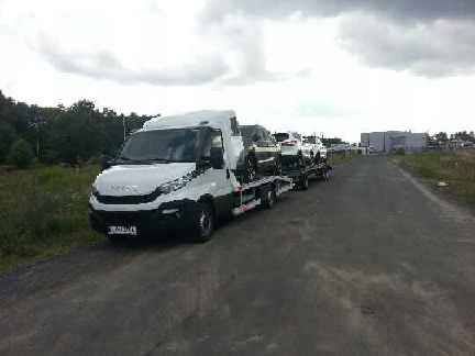 Transport samochodów  aut z Włoch Belgii Holandii Niemiec laweta
