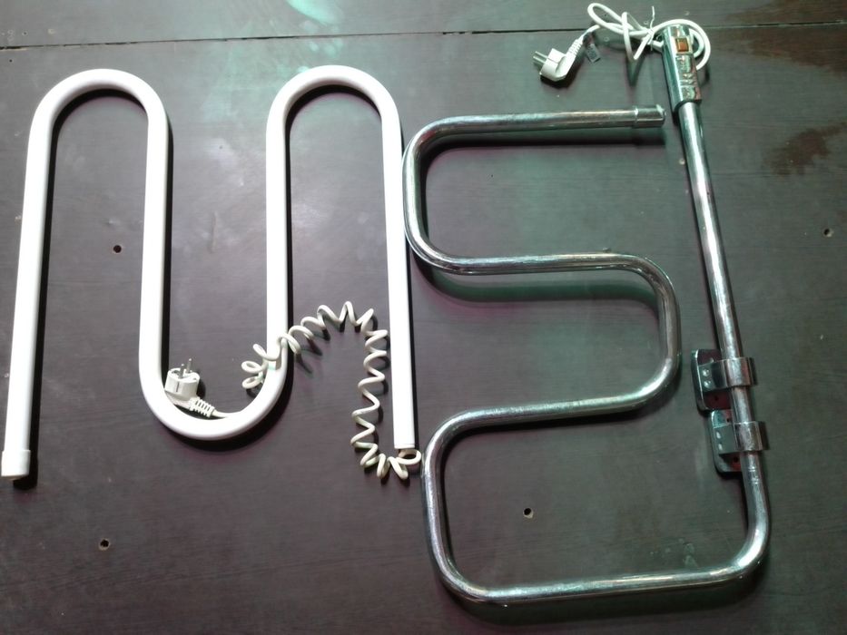 Вживаний електричний сушарка для рушників. Металевий каркас із вигнути