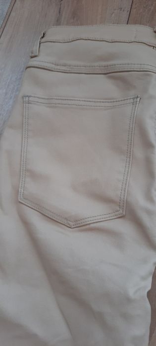 Spodnie woskowane beżowe L M Queen Hearts