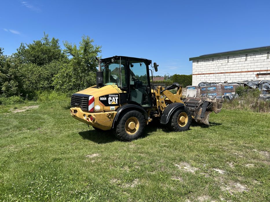 Caterpillar CAT 906H ładowarka z Niemiec + widły
