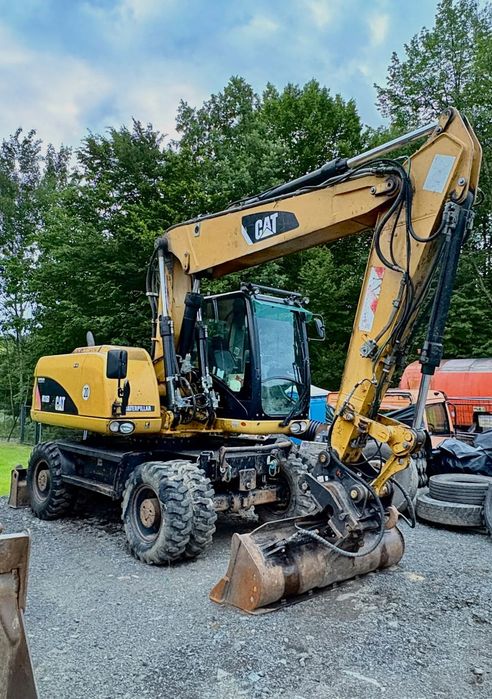 Caterpillar M315D  Caterpillar M315D 2011 | 145 KM | 15,9 t | Stan dobry