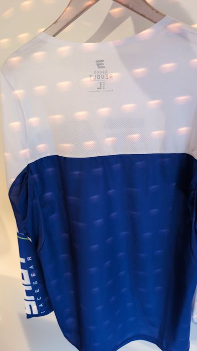 Proteção de bike, capacete, colete etc