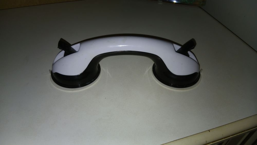 Ручка у ванну на присосках