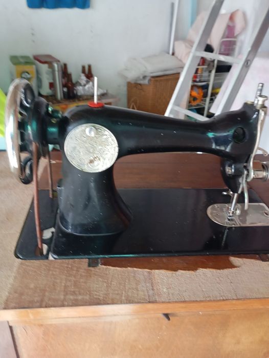 Máquina de costura singer