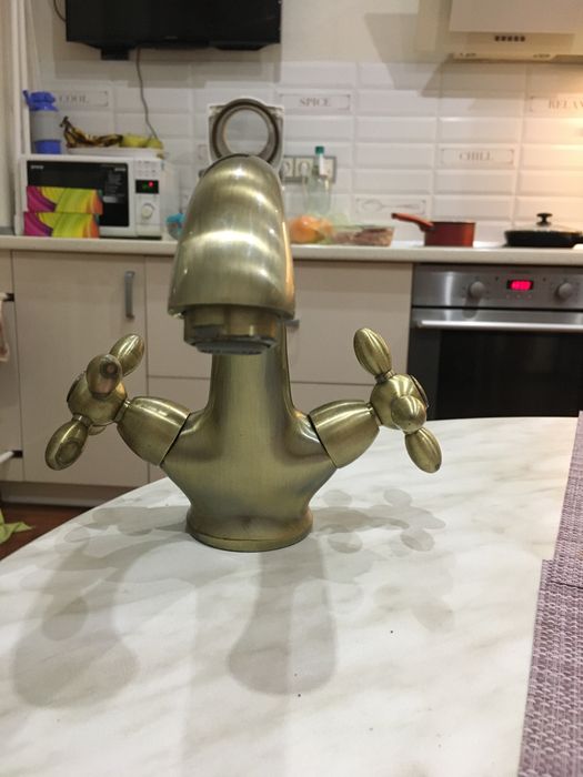 Смеситель на умывальник