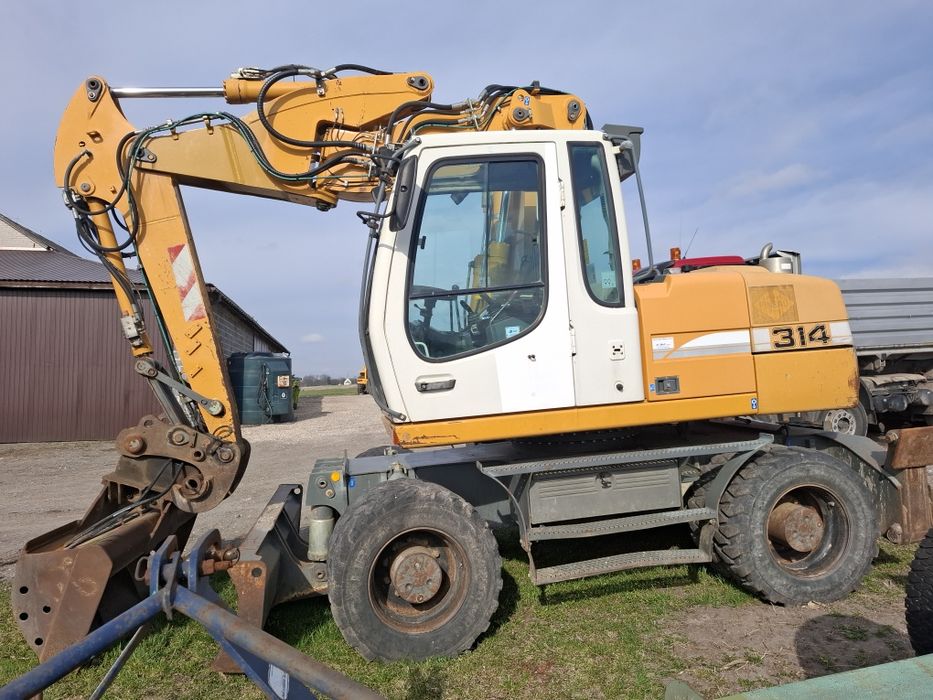 Koparka CASE WX120 Liebherr 314