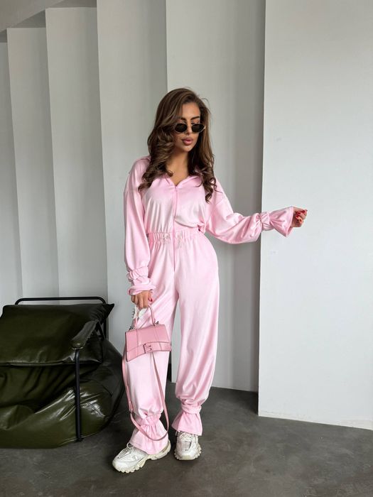 Рожевий велюровий комбінезон зі зйомними резинками