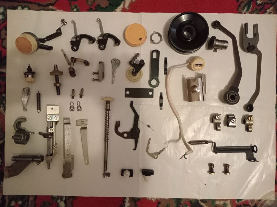 Запчасти швейных машин и оверлоков.