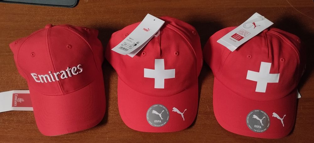 Кепки Puma і Emirates